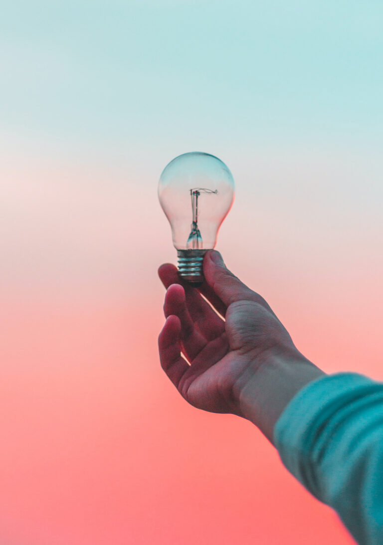 Digital marketer holding lightbulb